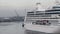 Timelapse sped up footage of traveling past a large cruise ship moored in a river