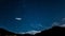 Timelapse stars and moon over mountain night sky. Moonrise