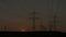 Timelapse Sunset Power Lines and Wind Turbine