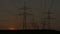 Timelapse Sunset Power Lines and Wind Turbine