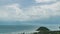 Timelapse of Tropical Island Coast with Approaching Rain Clouds. Zoom Out