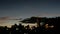 Timelapse of twilight cloudscape over the buildings.