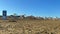 Timelapse of unidentifiable people in the late afternoon on Caorle beach in Veneto, Italy