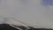 Timelapse video capturing the interplay between sunny weather , snowy blizzard at Palandoken Ski Resort from a distance