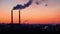 Timelapse video of oil refinery and air pollution at sunset