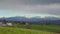 Timelapse view on the far mountains. Stormy clouds moves to the mountains