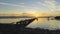 Timelapse view sunrise over old fisherman pier