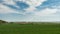 Timelapse - Wind Turbines under a partly cloudy sky