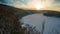 Timelapse of the winter forest landscape on the bank of a frozen river