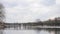 Timelapse Wooden bridge over the river in cloudy weather