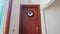 Timelapse wooden clock on the door