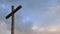 Timelapse of wooden cross on cloudy sky and copy space. Christian background, spiritual scene, God, religion and faith