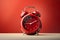 Timeless Charm: Red Vintage Alarm Clock