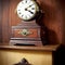 Timeless elegance of a vintage clock placed on a weathered wooden mantelpiece.