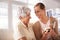 Timeless memories. a senior woman giving her daughter a pearl necklace.