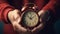 Timeless Moments: Elderly Man\\\'s Hands Grasping a Vintage Red Alarm Clock