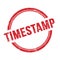 TIMESTAMP text written on red grungy round stamp