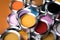 Tin cans with paint, brushes and bright palette of colors