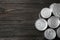 Tin cans on wooden background, top view. Recycling garbage