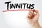 Tinnitus text with marker, medical concept background