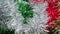 Tinsel-rain of red, white, green and golden color. New Year Christmas decorations for Christmas tree, interior or party