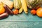 Tinted photo of blue wooden table with autumn vegetables