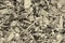 Tinted wood chips background pattern natural gray base