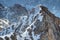 Tiny climbers ascend snowy Jubilaumsgrat route in Bavarian Alps