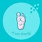 Tiny cute baby footprint with turquoise outline.