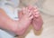 Tiny feet of newborn baby