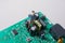 Tiny figurine of men model on Circuit board