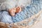 Tiny foot of newborn baby. Soft newborn baby feet on a blue blanket