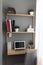 Tiny Home Office Desk With Ample Shelving