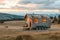 A tiny home on wheels in a picturesque landscape.