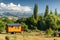 A tiny home on wheels in a picturesque landscape.