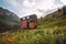 tiny house on wheels, parked in scenic mountain landscape