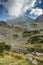 Tiny lake with high peaks of Tatras