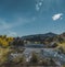 Tiny lake with mountains in the background