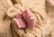 Tiny little toes of infant sleeping wrapped up in blanket