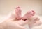 Tiny newborn baby\'s feet