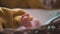Tiny newborn baby\'s feet closeup. Mom and her child. Happy family concept. Beautiful conceptual video of maternity.