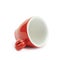 Tiny red espresso cup isolated