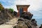 A tiny shed on a rocky cliff of Alicudi island.