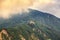 Tiny village close to Camogli and Mediterranean coast right on the top of the mountain covered by clouds, Liguria, Italy