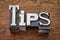 Tips word in metal type