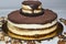 Tiramisu cake with cinamon on the top and chocolate fudge
