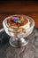 Tiramisu in glass cup is a coffee-flavoured Italian dessert.