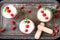 Tiramisu with raspberry in glasses on metal tray. Three portion. Italian dessert. Top view.