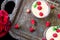 Tiramisu with raspberry in glasses on metal tray. Three portion. Italian dessert. Top view.