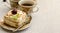 Tiramisu, a traditional Italian dessert in a light background. Close-up